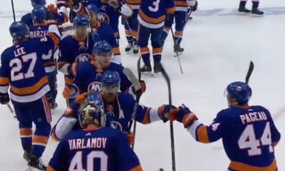 Islanders forwards and defensemen celebrate Game 1 win