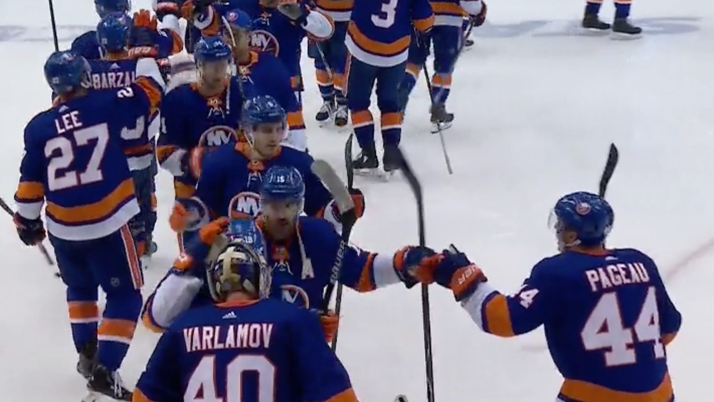 Islanders forwards and defensemen celebrate Game 1 win