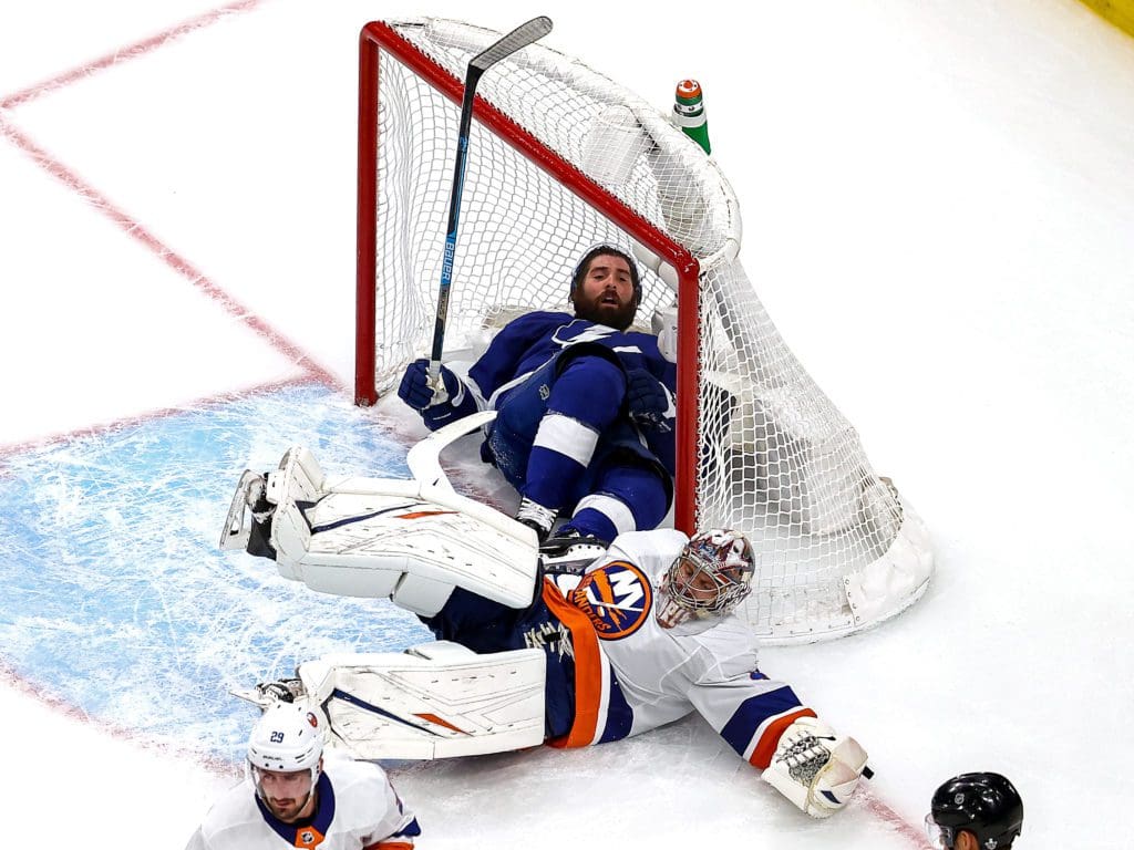 EDMONTON, ALBERTA - SEPTEMBER 09: Pat Maroon #14 of the Tampa Bay Lightning is checked into the goal as Semyon Varlamov #40 of the New York Islanders tends net during the second period in Game Two of the Eastern Conference Final during the 2020 NHL Stanley Cup Playoffs at Rogers Place on September 09, 2020 in Edmonton, Alberta. (Photo by Bruce Bennett/Getty Images)