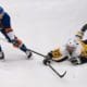 New York Islanders Adam Pelech against Sidney Crosby