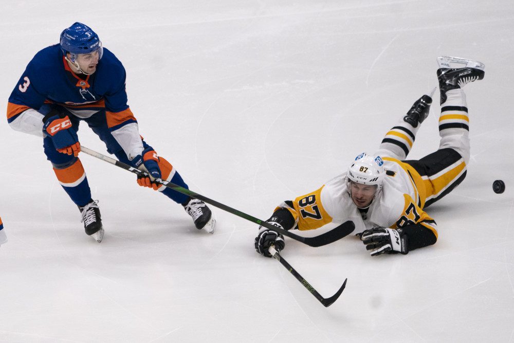 New York Islanders Adam Pelech against Sidney Crosby