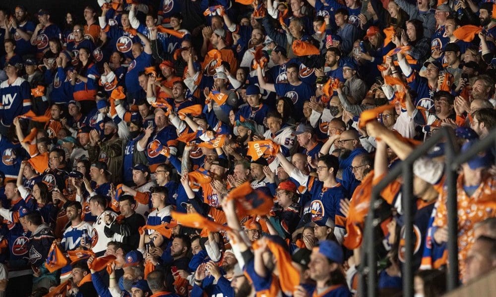 UNIONDALE, NY - JUNE 03: New York Islanders fans cheer during the third period of Game 3 of the NHL Stanley Cup Playoffs Second Round between the Boston Bruins and the New York Islanders on June 3, 2021, at the Nassau Coliseum in Uniondale, NY. (Photo by Gregory Fisher/Icon Sportswire)